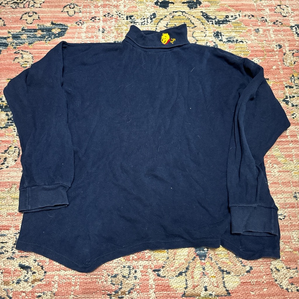 Winnie the Pooh turtleneck.